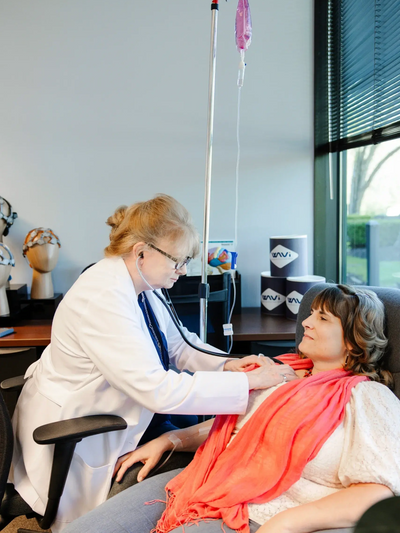 A patient getting IV nutrient therapy.