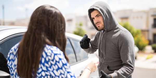 male robbing female