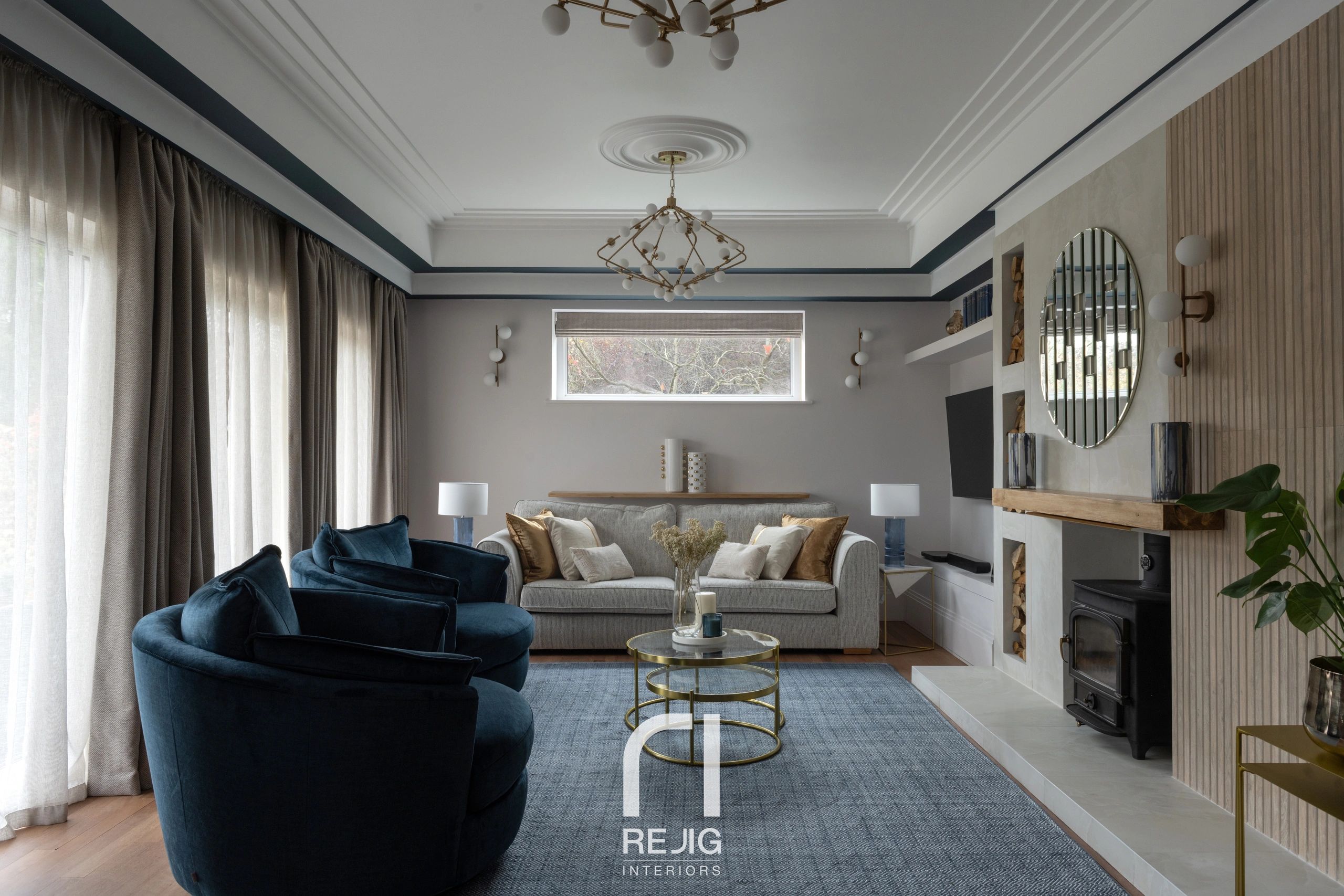 Modern living room with elegant furniture and fireplace.