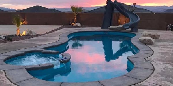 concrete pool deck with sunset southern utah