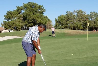 man about to take shot at golf hole at 2024 Nevada Senior Games. Photo by Tim Dorman.