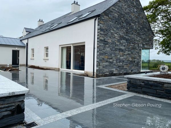 Black Porcelain Tiles with Silver Granite Cobble Border