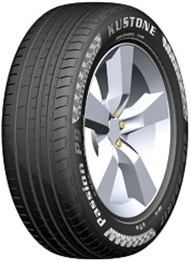 Close-up of a car tire with alloy wheel and white lettering.