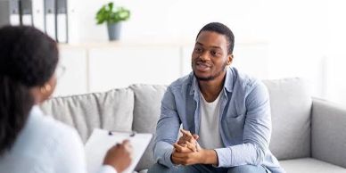 Man talking to a therapist.