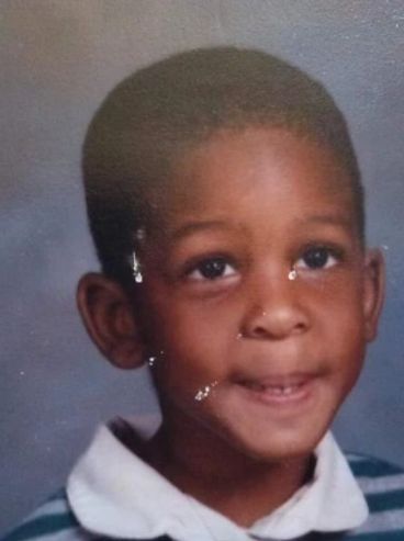 A young smiling Joseph Dinkins.