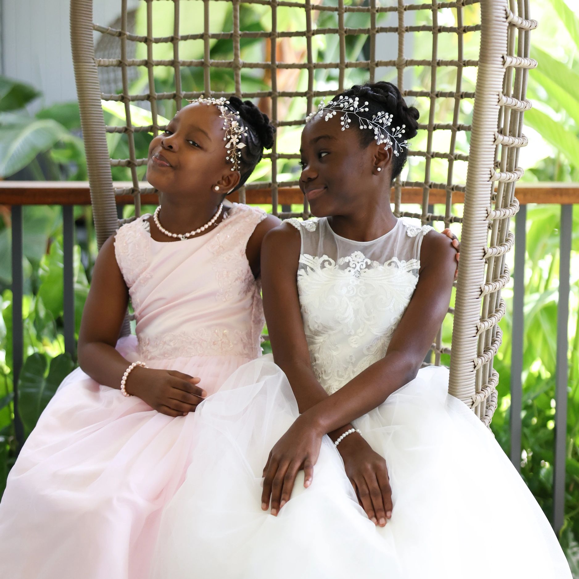 Two little Bahamian flower girls on a family member's wedding day