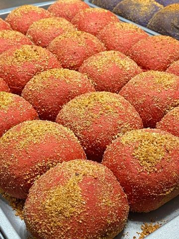 Soft, fluffy, rich, slightly chocolatey taste in a warm, pillowy pandesal, filled with sweet cream