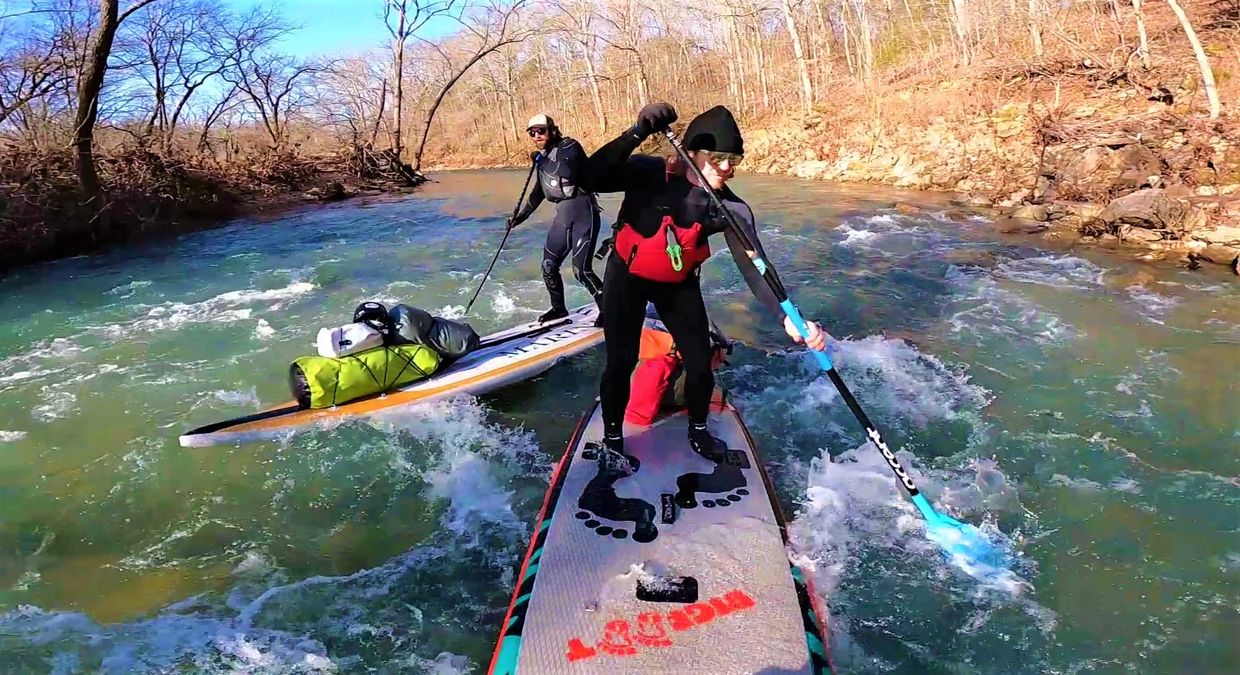 Ozark River Walkers paddleboarding down Jacks Fork River