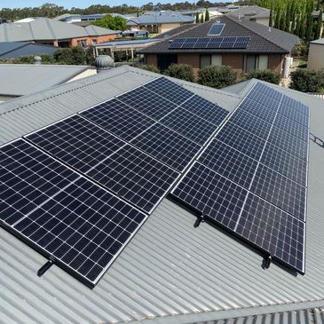 Solaredge smart panels on tin roof with Clenergy black railing.