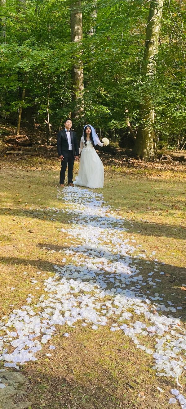 A walk down the aisle in Lorimer Park just before the wedding ceremony begins.