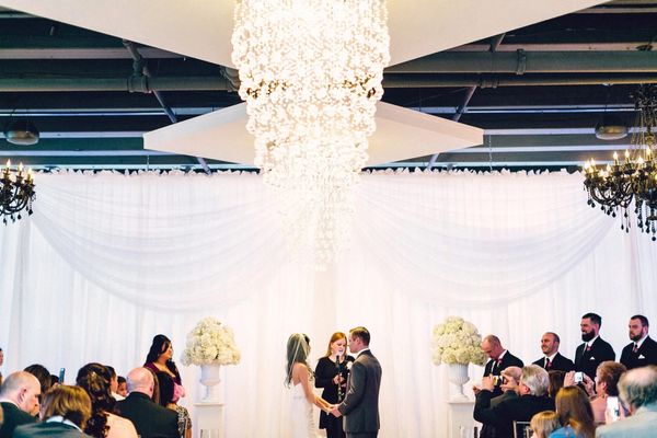 Our offsite officiant reading the ceremony at Tendenza in Philadelphia.