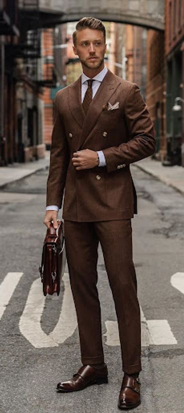 Brown double breasted suit with custom made dress shirt with brown tie and matching hankie