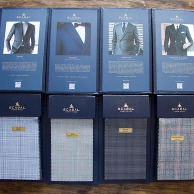 Bespoke suit fabrics. Custom made suits for woman. Italian suit fabrics 100% wools suits