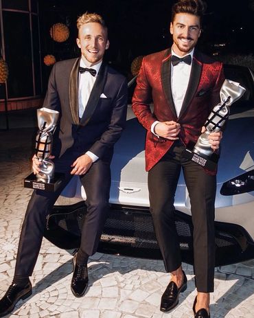 Men's tuxedos with black bow ties and white tuxedo shirts and black pants custom tailored