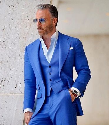 Men's custom made French blue suit with vest. Light blue custom made dress shirt white silk hankie 