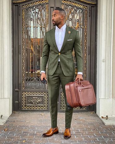 Men's olive green suit white dress shirt brown dress shoes brown leather bag