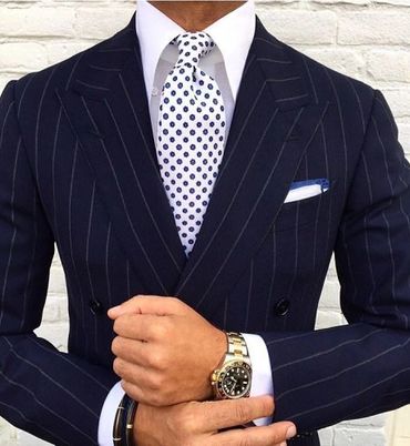 Men's bespoke navy blue pinstripe suit with white blue dot tie and hankie custom made