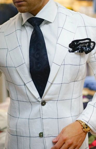 Men's white blazer navy blue tie and navy blue hankie with custom made white dress shirt