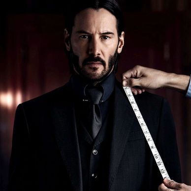 Men's bespoke suits. Custom tailored black suit with vest black shirt black tie custom made.