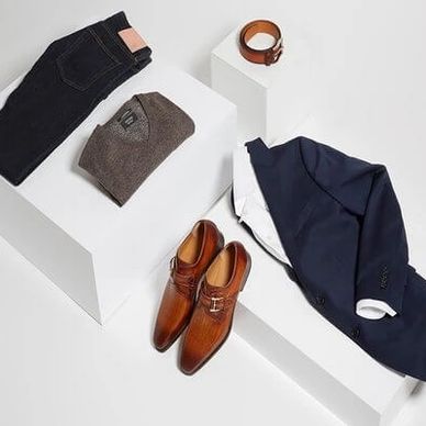 Custom made Jeans for men. Navy blue blazers. Brown dress shoes. Men's brown belts grey sweater