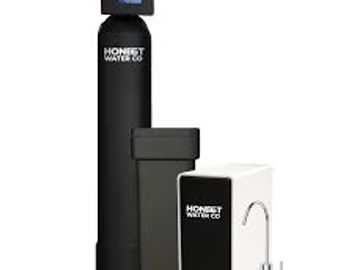 Honest Water Co water filtration system with sleek black design.