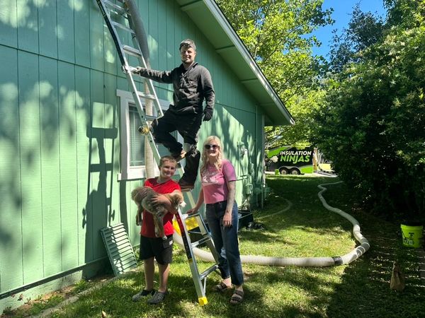 Attic insulation service in Redding, CA by The Insulation Ninjas for comfort.