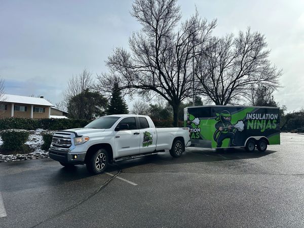 Branded Insulation Ninjas truck and trailer ready for local insulation work.
