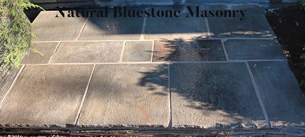 A mortared natural bluestone landing patio constructed for one of our clients in Binghamton, NY!