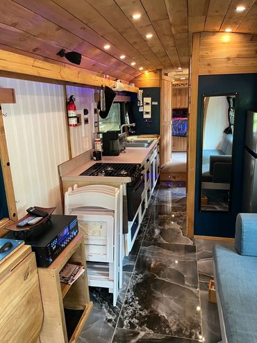 Full kitchen with porcelain floors,