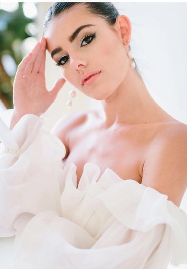 modern updo and modern clean bridal makeup