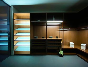 Bedroom remodel brown shelving and some decor scattered about