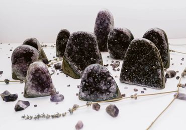 High quality Amethyst crystal clusters of varying heights with dried lavender stems and clear crysta