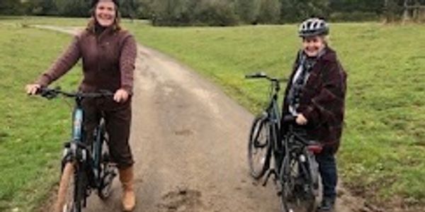 Sandi Toksvik and Jessica Hynes on our Willow eBikes Batribike Nova-S hybrid eBikes.