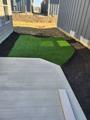 Concrete patio and pet turf