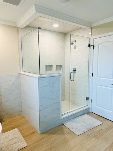 Custom shower in bathroom remodel in Frankfort with shower bench and shower niche
