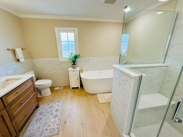 complete bathroom remodel in Frankfort with shower bench and soaker tub