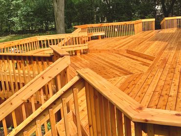 New cedar deck build in mokena with deck sealer