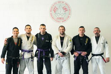 Professor Laercio and Professor Danny with the Purple belt squad.