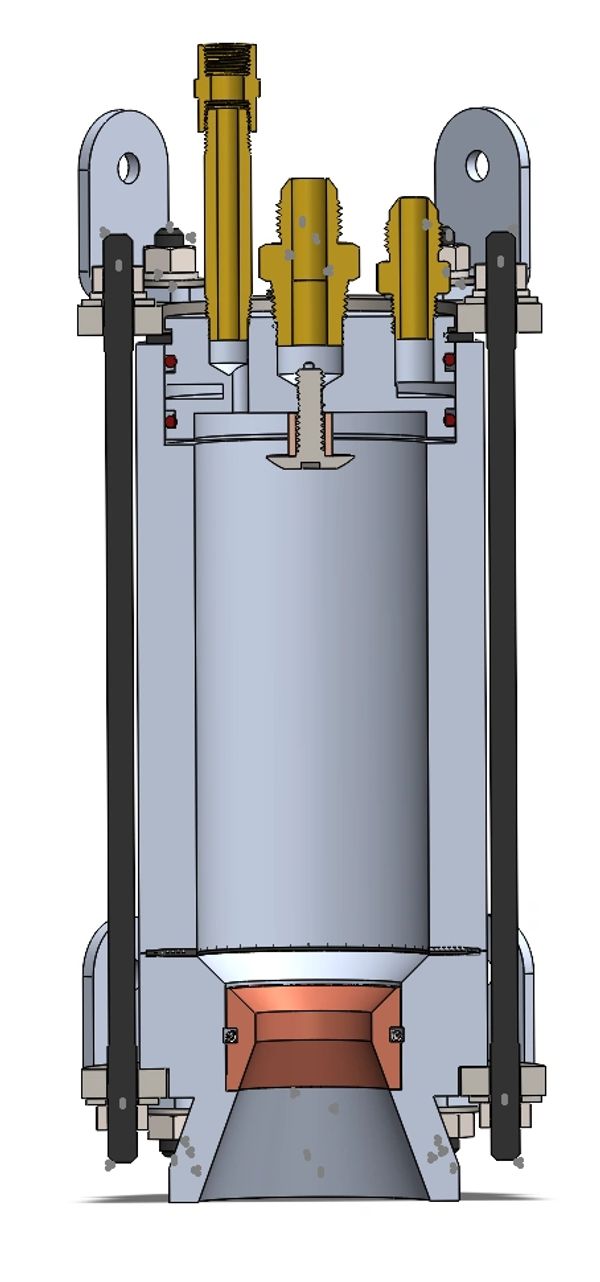 Cross-section of a mechanical component with metal and brass fittings.