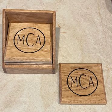 Set of 4 4" White Oak personalized coasters with beveled edge in cradle