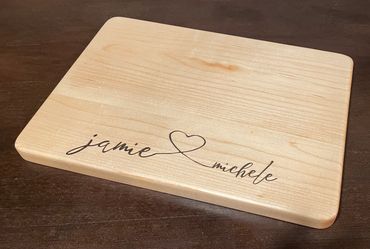 Simple Elegance is a beautiful Maple 16 x 11 x 1 personalized cutting/serving/charcuterie board.