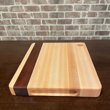 Rebel 78 is a thick reversible 14 1/2" x 12" x 1 1/2" Maple/Walnut EDGE grain chopping block