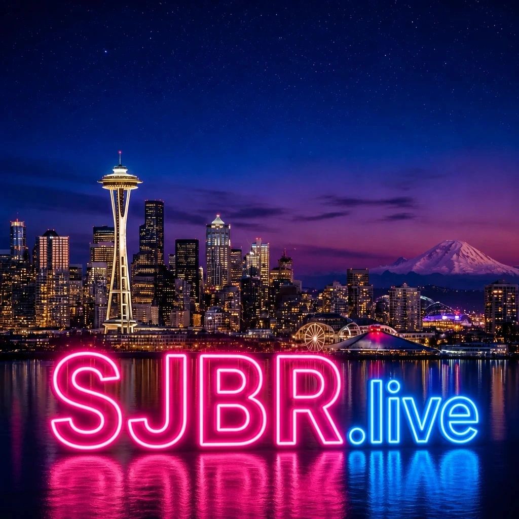 Seattle skyline at night with SJBR.live neon text.