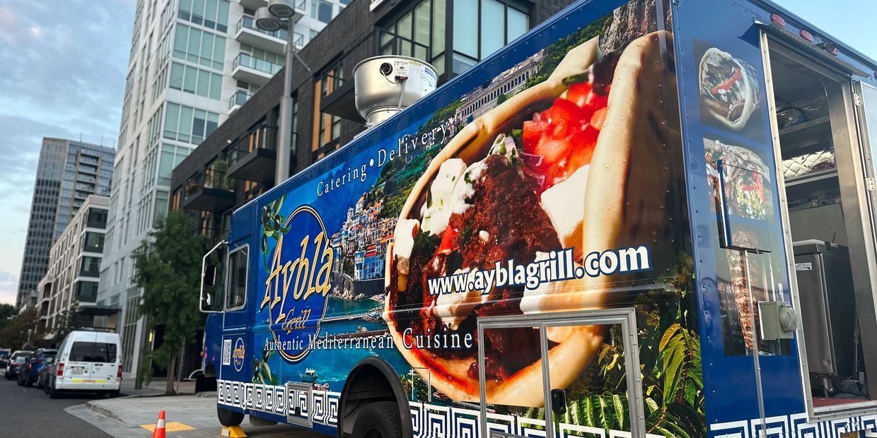 A blue color food truck