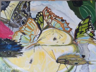A colourful abstract of butterflies feeding on fruit
