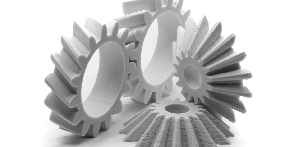 Fused Deposition Modeling (FDM)
3D printed helical and bevel gears printed in white PLA.