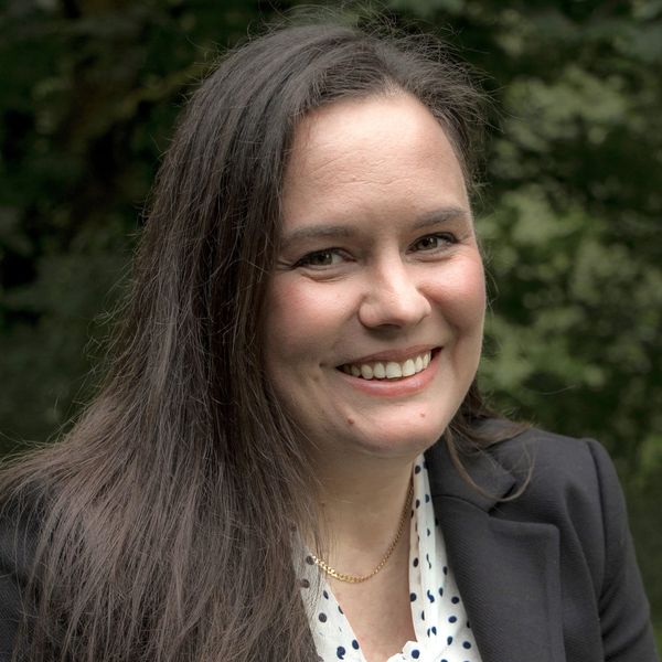 head shot of woman smiling