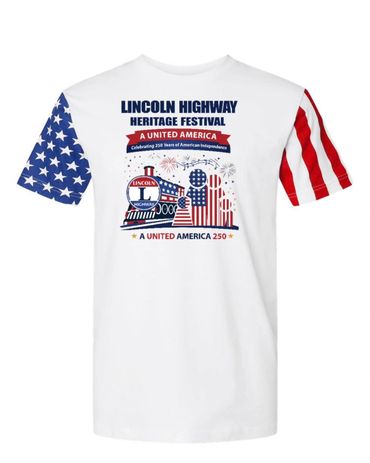 White T-shirt celebrating Lincoln Highway Heritage Festival with American flag sleeves.