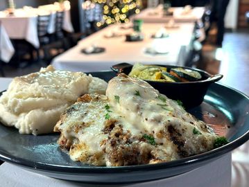 Grilled Chicken topped with ranch dressing, cheese and topped with Parmesan Crumble.