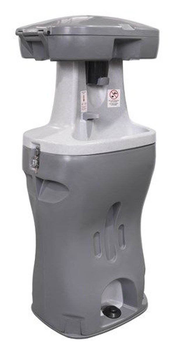 Hand wash sink. This basic unit uses a foot peddle to pump water to allow for hand washing.